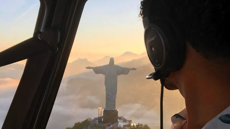 Luxury private helicopter in flight over Sugarloaf Mountain on a helicopter ride in Rio de Janeiro, Brazil