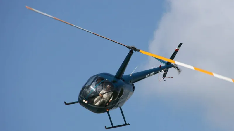 Private helicopter passing Christ the Redeemer on a helicopter ride in Rio de Janeiro, Brazil